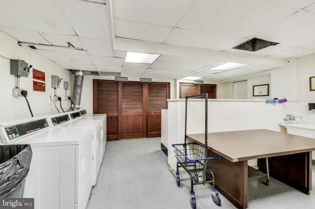 a view of a workspace with furniture