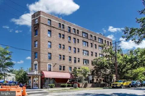 a front view of a building with street view