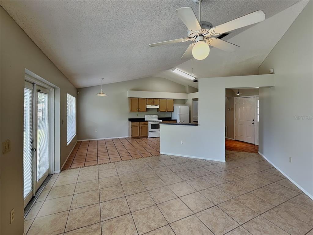 1618 Cassingham Circle Ocoee, FL 34761 - Photo 2 of 15 a view of an empty room and window