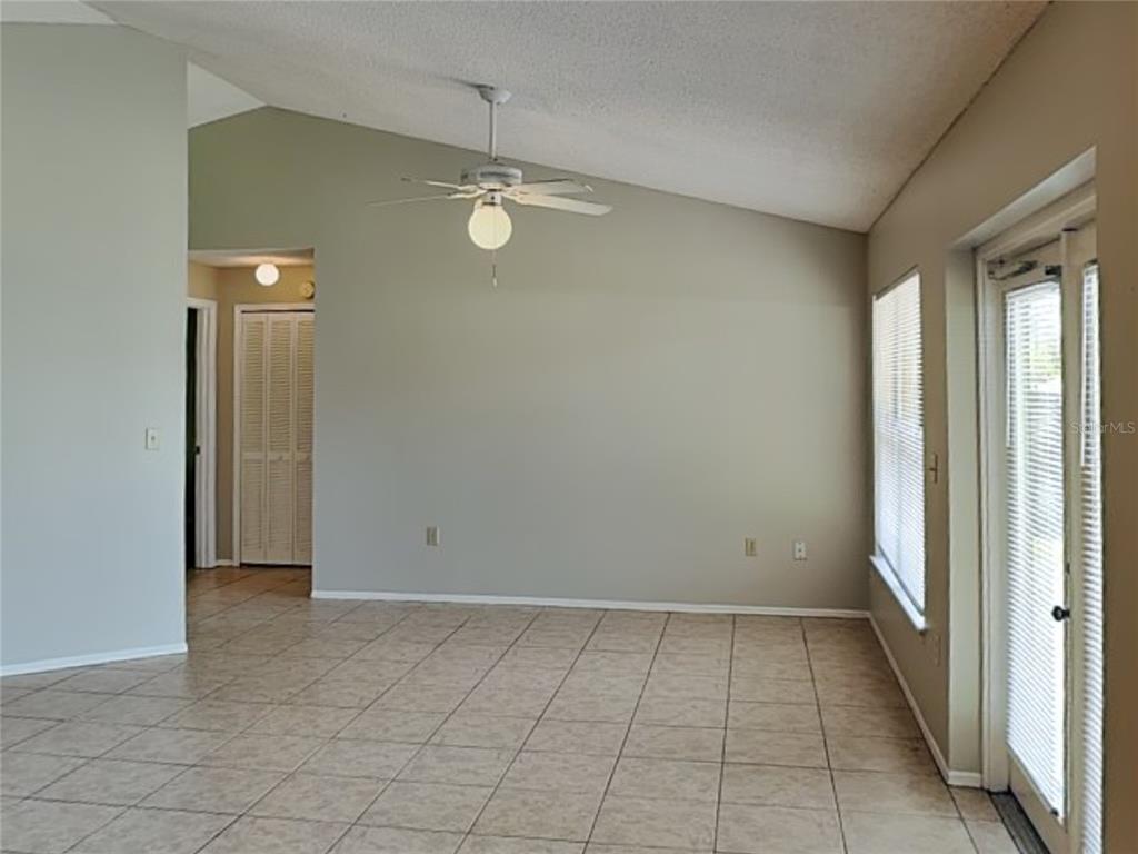 1618 Cassingham Circle Ocoee, FL 34761 - Photo 3 of 15 an empty room with windows
