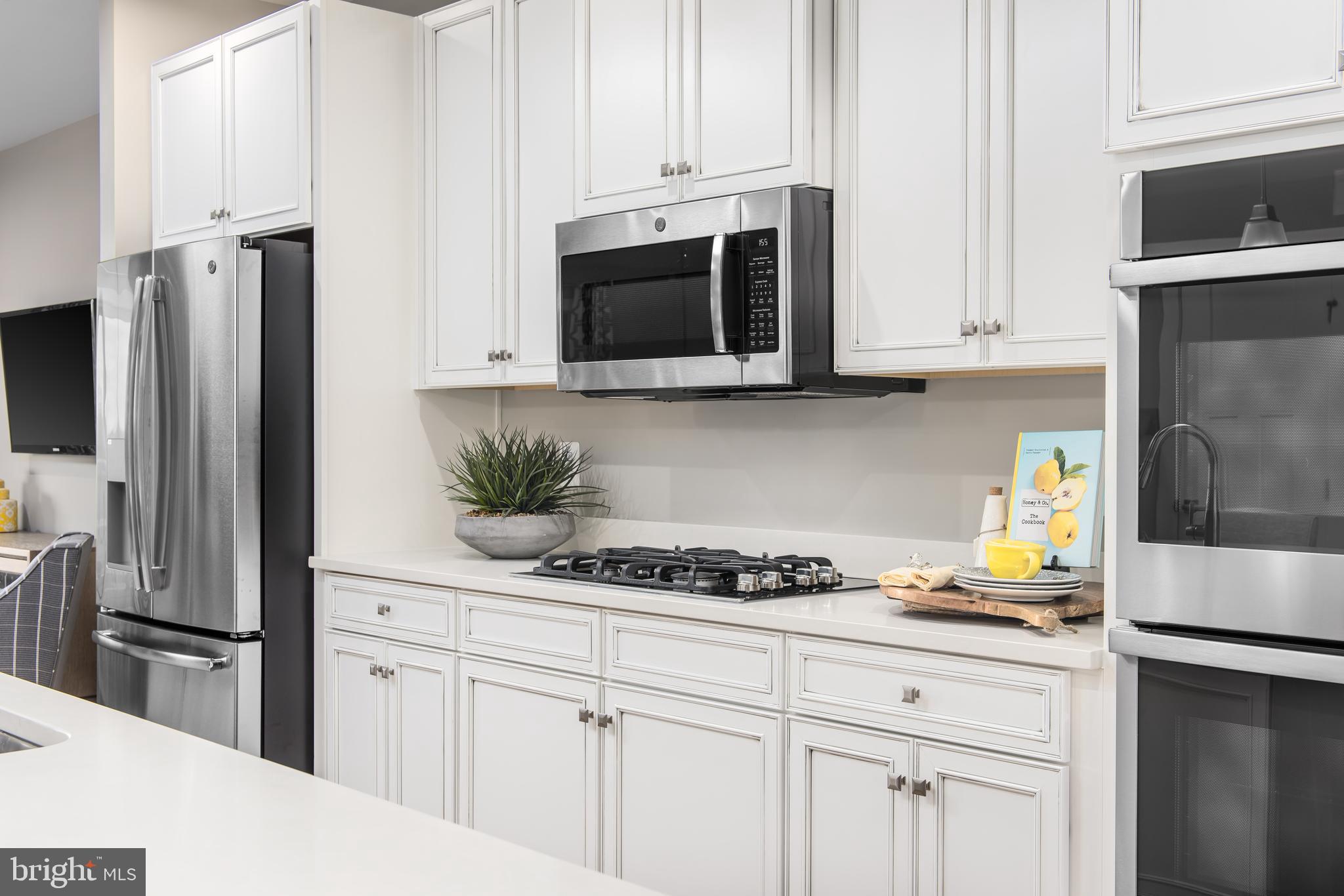 14530 Mattawoman Drive, Unit K Brandywine, MD 20613 - Photo 6 of 16 Kitchen with Cooktop & Double Wall Ovens