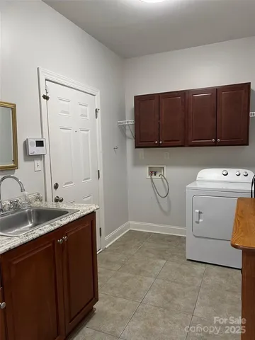 a bathroom with a sink a vanity and a mirror