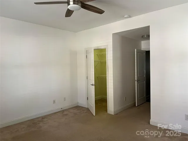 an empty room with a bathroom