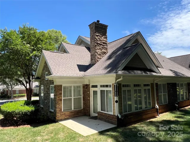 a view of a house with a garden