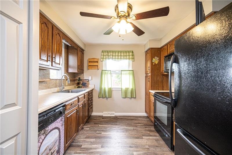 1721 Elderslee Road Pittsburgh, PA 15227 - Photo 8 of 16 Kitchen with brand new flooring.