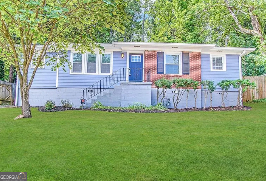 3729 Glenwood Road Decatur, GA 30032 - Photo 1 of 1 front view of a house with a yard