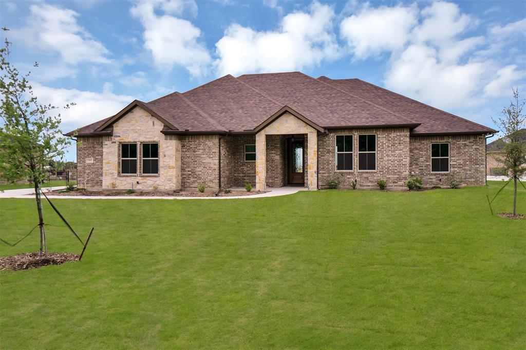 10493 County Road 346 Terrell, TX 75161 - Photo 1 of 1 a front view of house with yard and green space