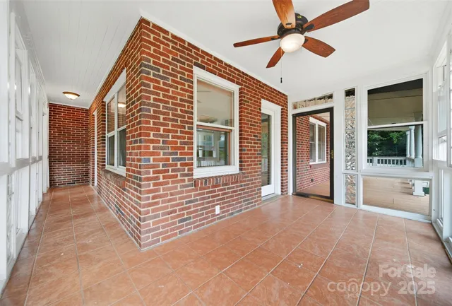 a view of a balcony with a ceiling fan
