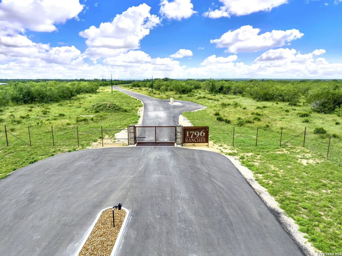 0 Fm 1796 D'Hanis, TX 78850 - Photo 2 of 26 a view of a street with a big yard