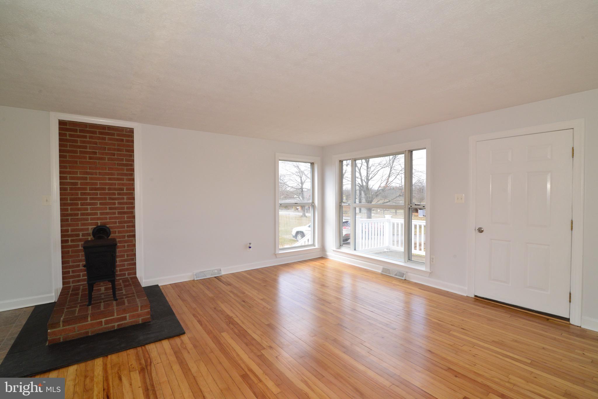 918 Wadesville Road Berryville, VA 22611 - Photo 11 of 45 Family Room and JUTAL wood stove