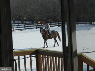 918 Wadesville Road Berryville, VA 22611 - Photo 35 of 45 Equestrians riding in adjacent yard