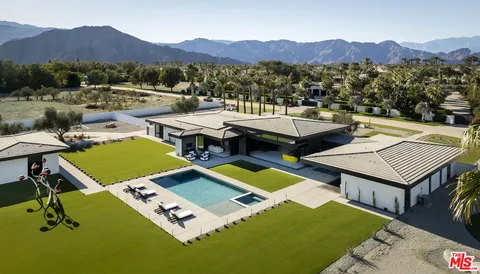 a view of a swimming pool with an ocean view