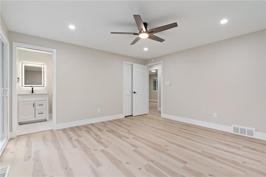 4309 Bulltown Road Murrysville, PA 15668 - Photo 17 of 34 a view of an empty room and wooden floor