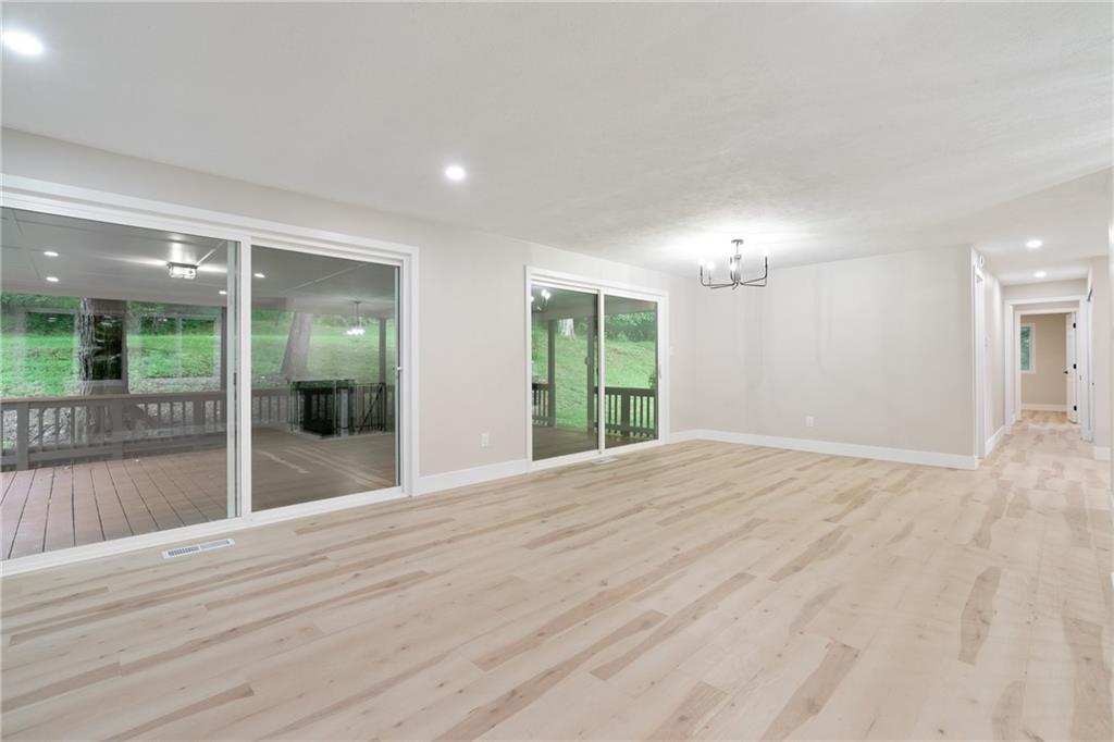 4309 Bulltown Road Murrysville, PA 15668 - Photo 7 of 34 a view of empty room with wooden floor and fan