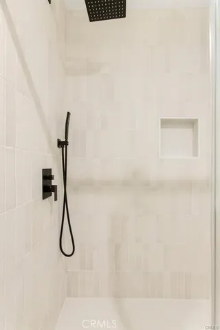 a walk in closet in a bathroom