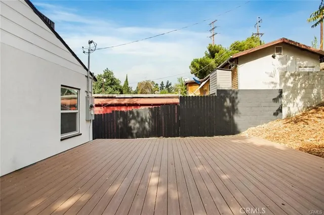 a view of a house with a roof deck