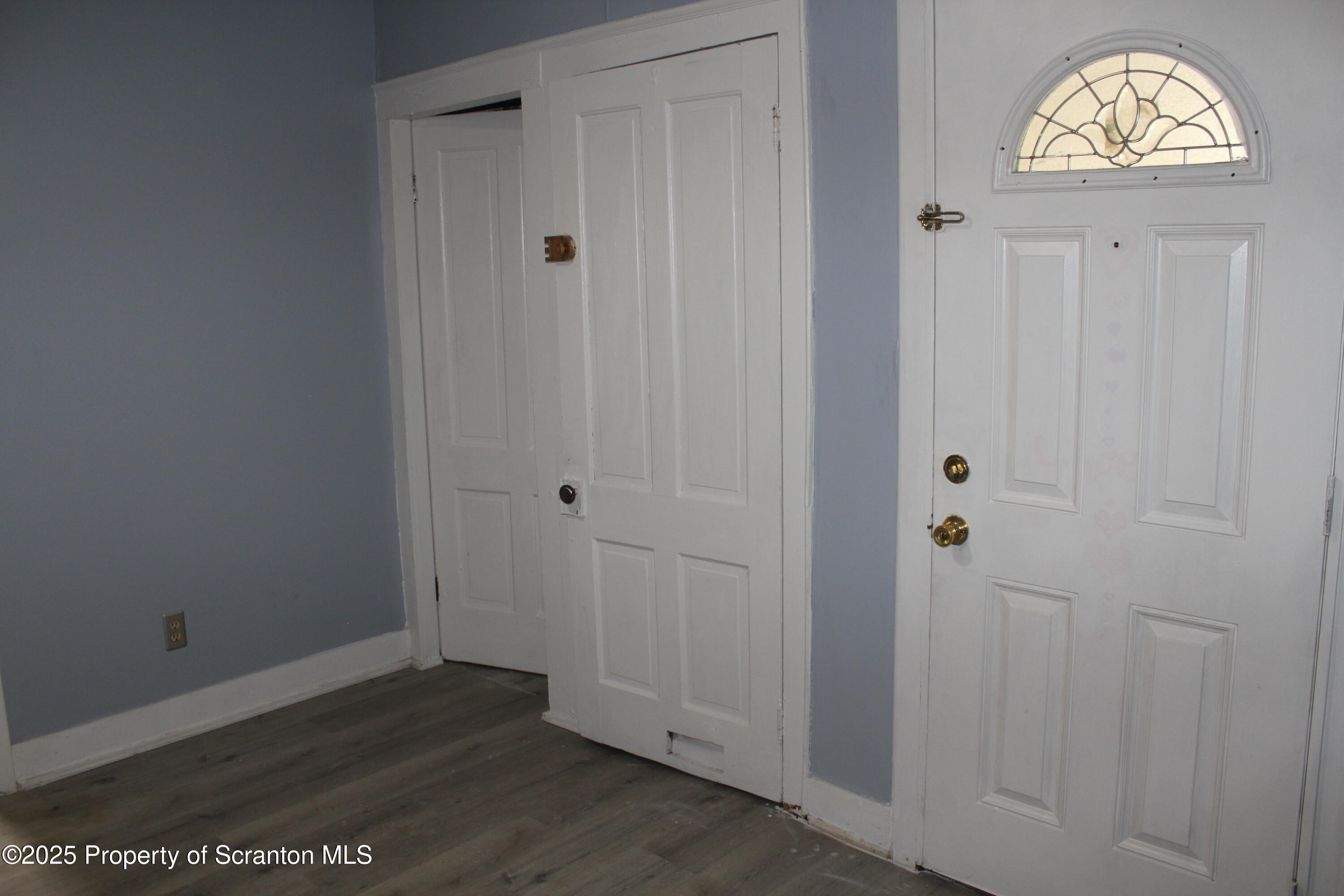 1507 Luzerne Street Scranton, PA 18504 - Photo 11 of 26 a view of an entryway with wooden floor