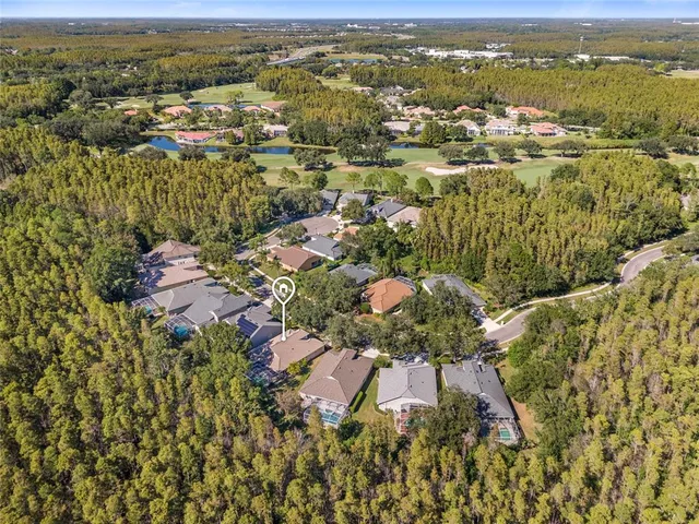 an aerial view of a city with lots of residential buildings