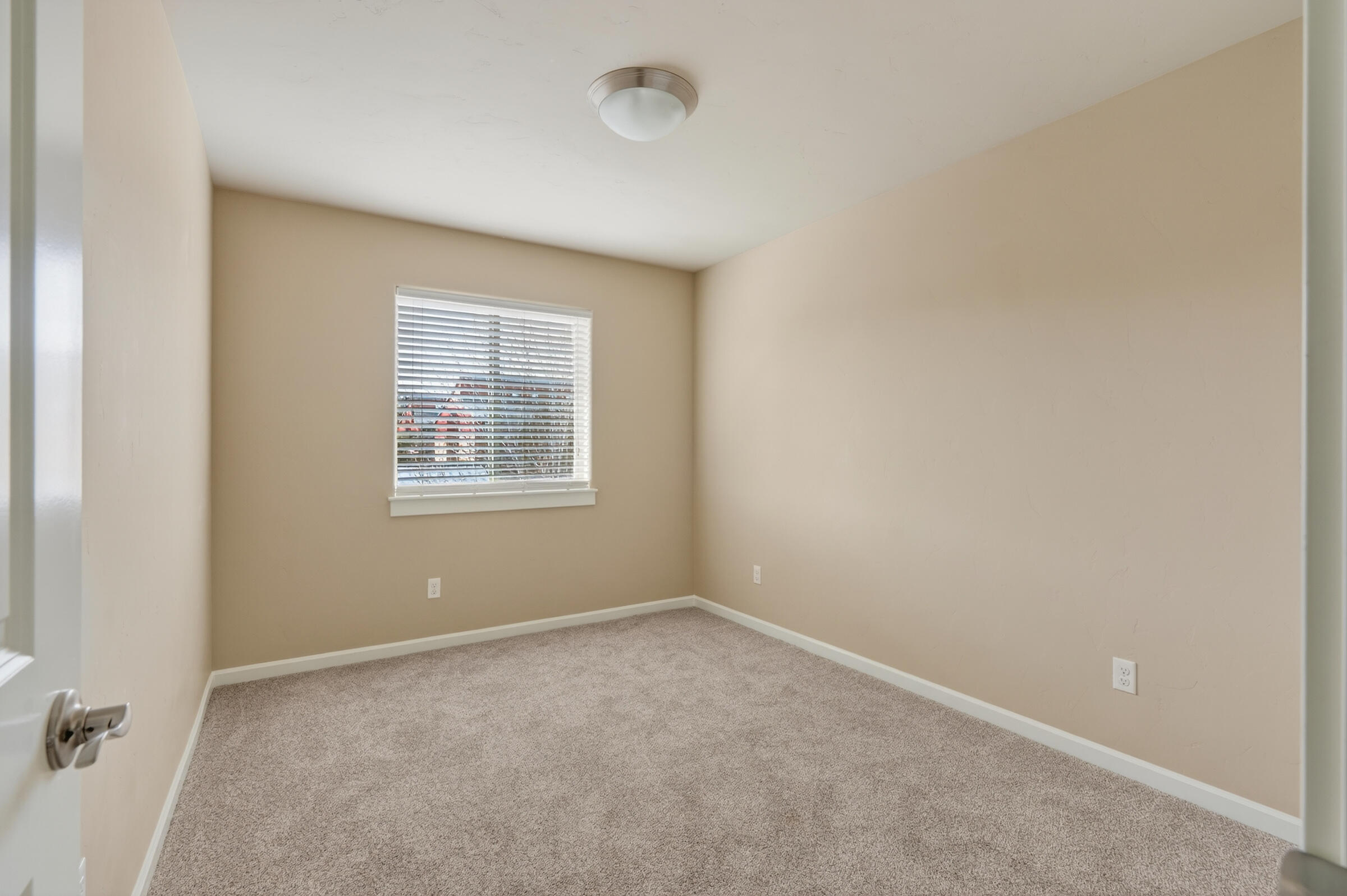 3365 Southwest 28th Street Redmond, OR 97756 - Photo 24 of 39 an empty room with windows