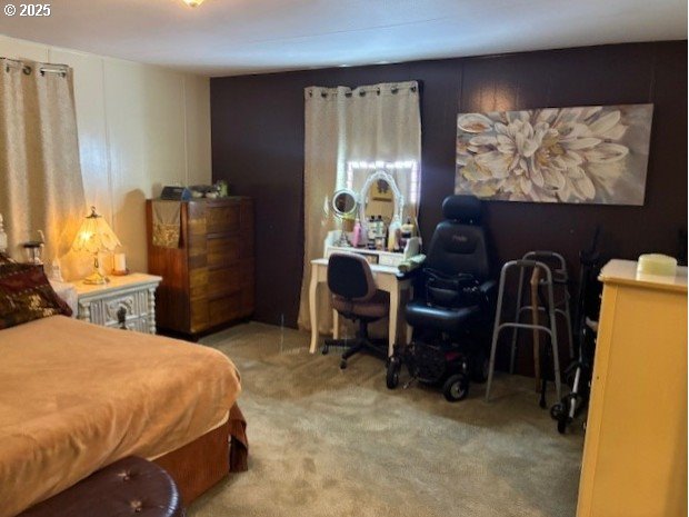 8738 Buckhorn Road Roseburg, OR 97470 - Photo 23 of 45 a bed room with furniture and a potted plant