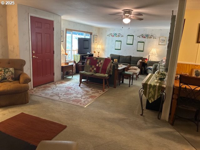 8738 Buckhorn Road Roseburg, OR 97470 - Photo 10 of 45 a living room with furniture and a chandelier