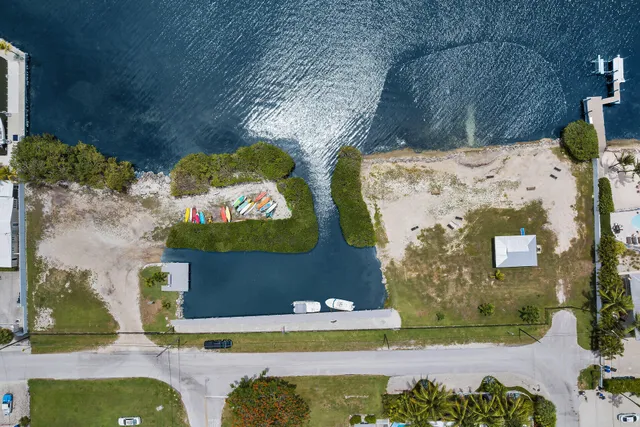a view of swimming pool with a outdoor seating and plants