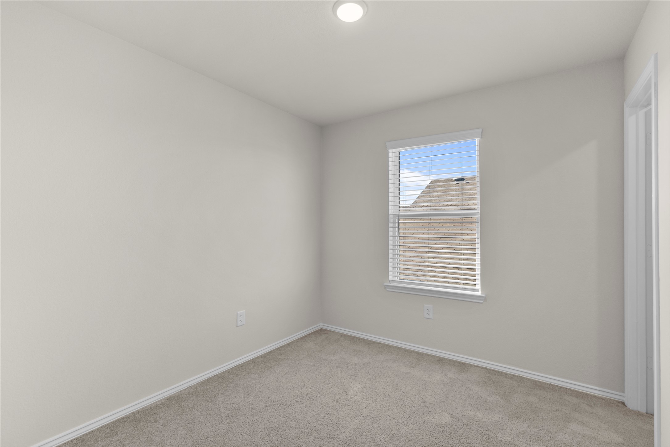 25639 Royal Catchfly Road Katy, TX 77493 - Photo 21 of 48 a view of an empty room with a window