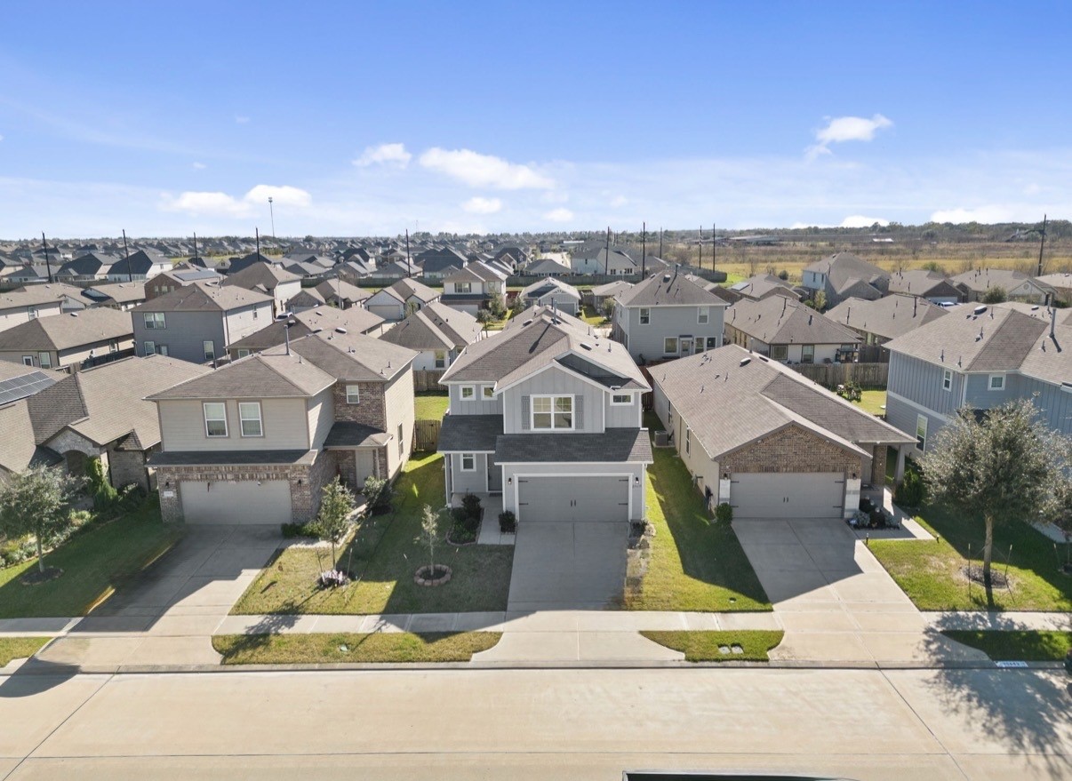 25639 Royal Catchfly Road Katy, TX 77493 - Photo 3 of 48 an aerial view of a house with swimming pool