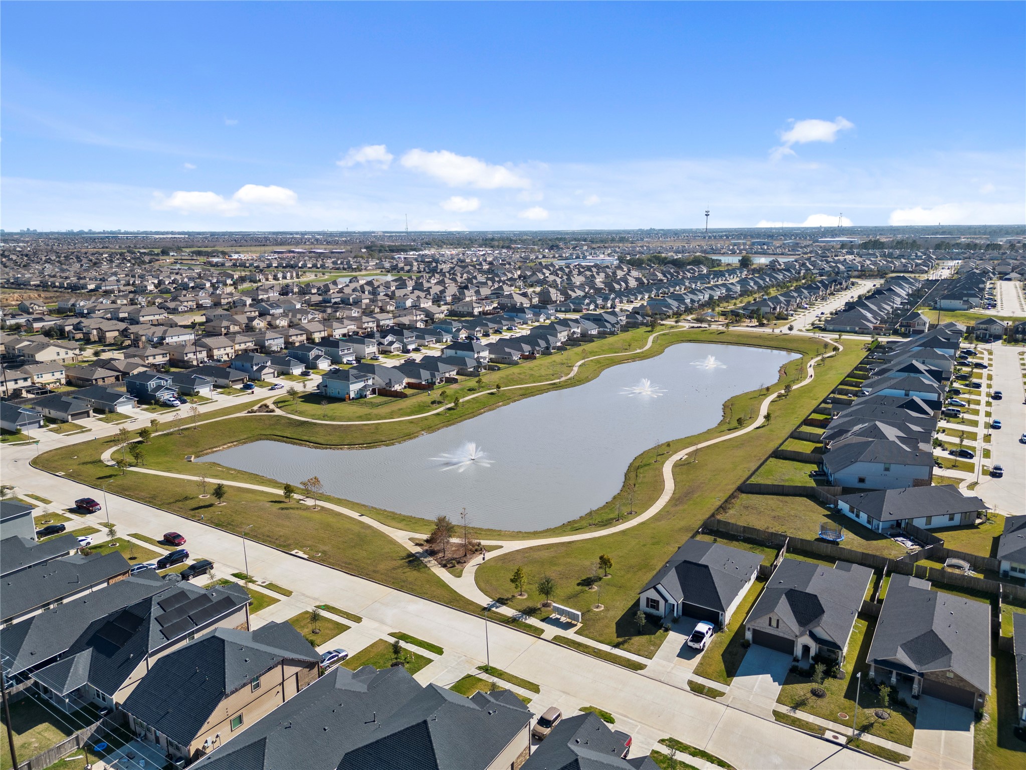 25639 Royal Catchfly Road Katy, TX 77493 - Photo 6 of 48 an aerial view of a tennis ground and a terrace