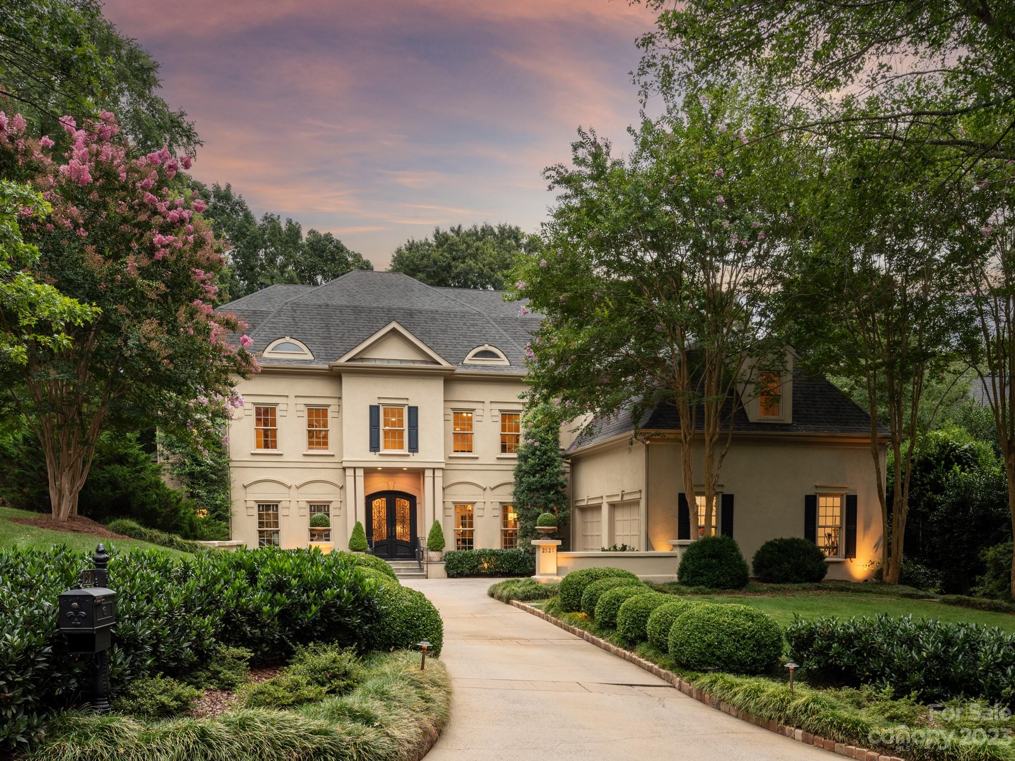 2521 Summerlake Road Charlotte, NC 28226 - Photo 1 of 48 a front view of a house with a yard