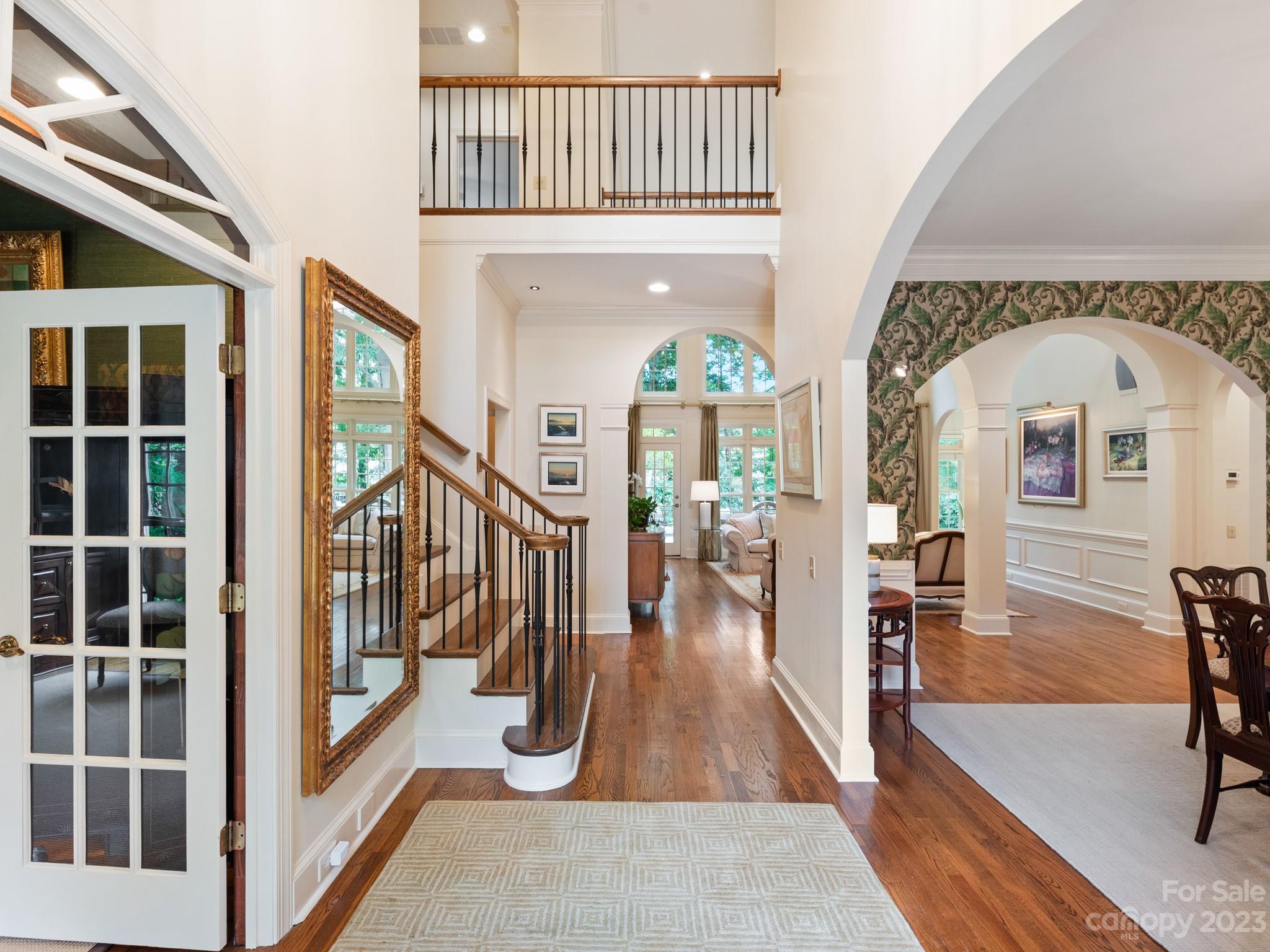 2521 Summerlake Road Charlotte, NC 28226 - Photo 11 of 48 a view of front door with dining room and wooden floor