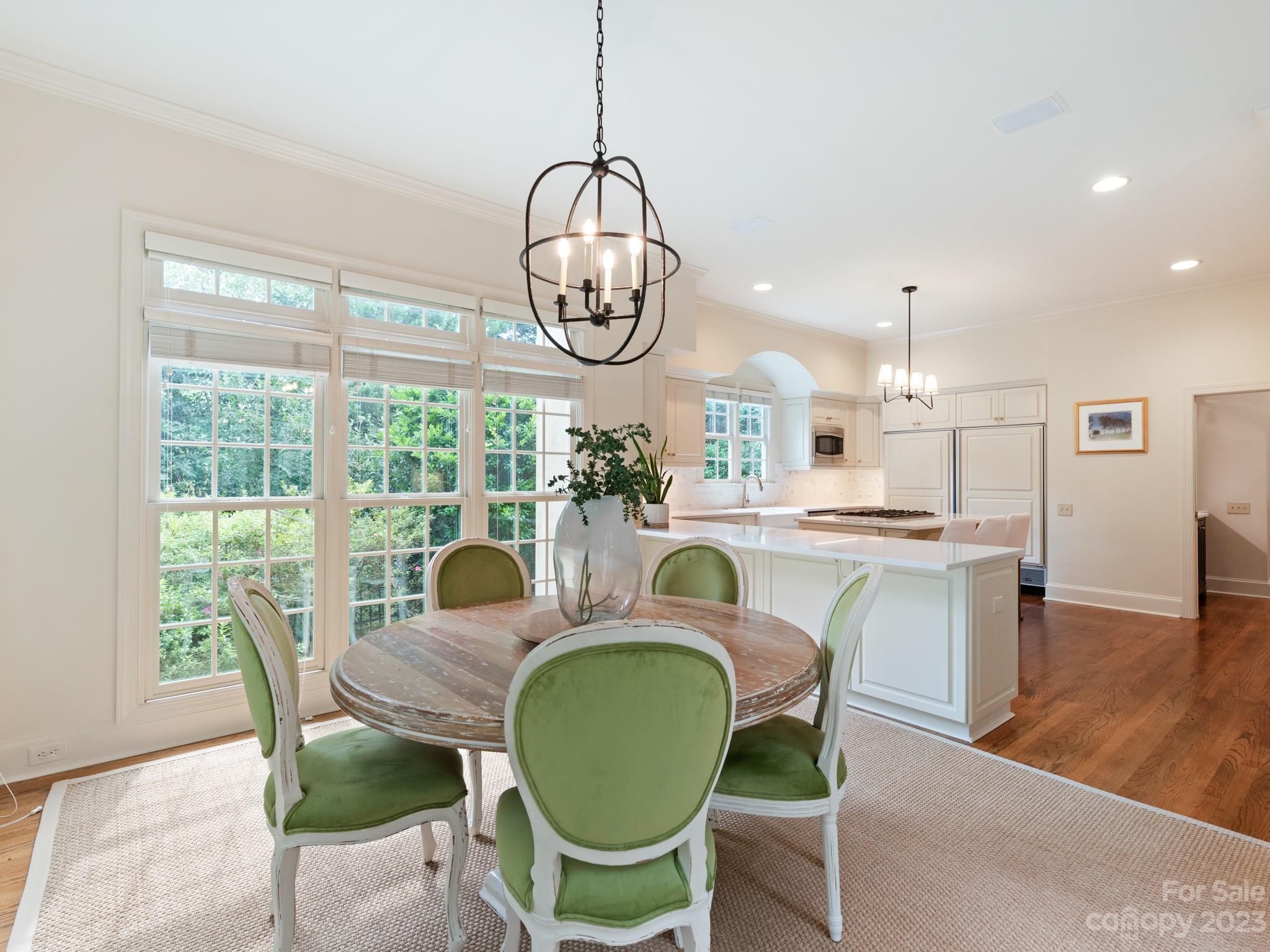2521 Summerlake Road Charlotte, NC 28226 - Photo 21 of 48 a view of a dining room with furniture window and wooden floor