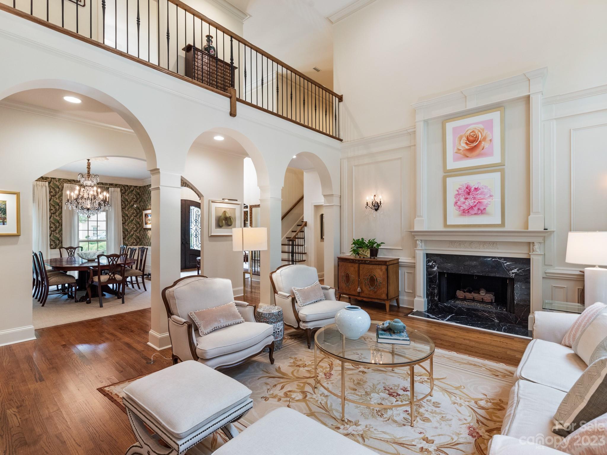2521 Summerlake Road Charlotte, NC 28226 - Photo 25 of 48 a living room with furniture and a fireplace