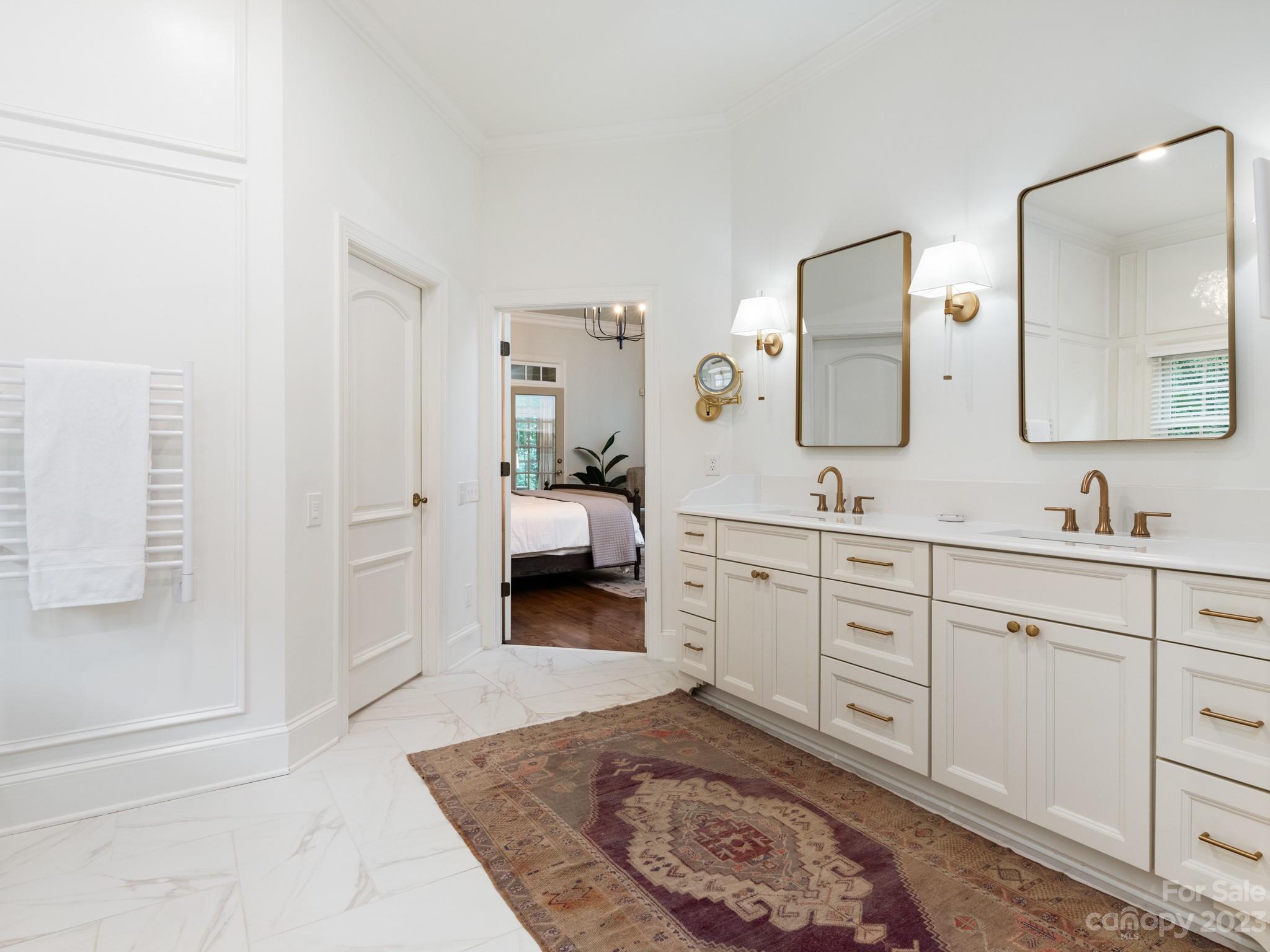 2521 Summerlake Road Charlotte, NC 28226 - Photo 29 of 48 a spacious bathroom with a double vanity sink and mirror