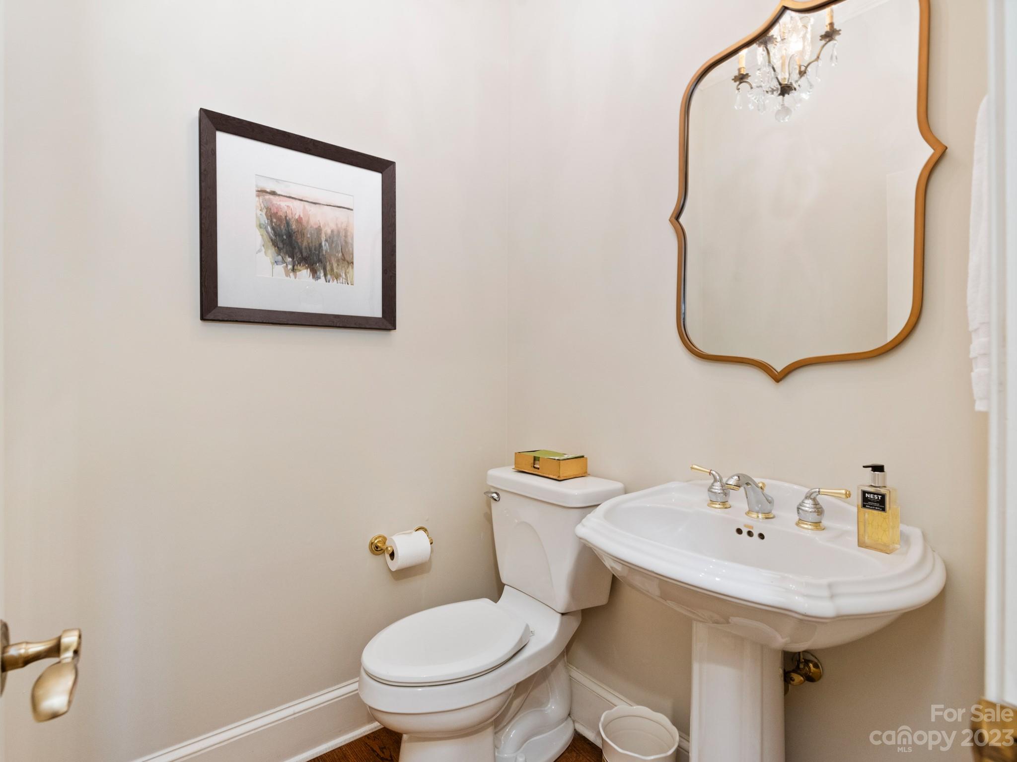 2521 Summerlake Road Charlotte, NC 28226 - Photo 34 of 48 a bathroom with a sink mirror and toilet