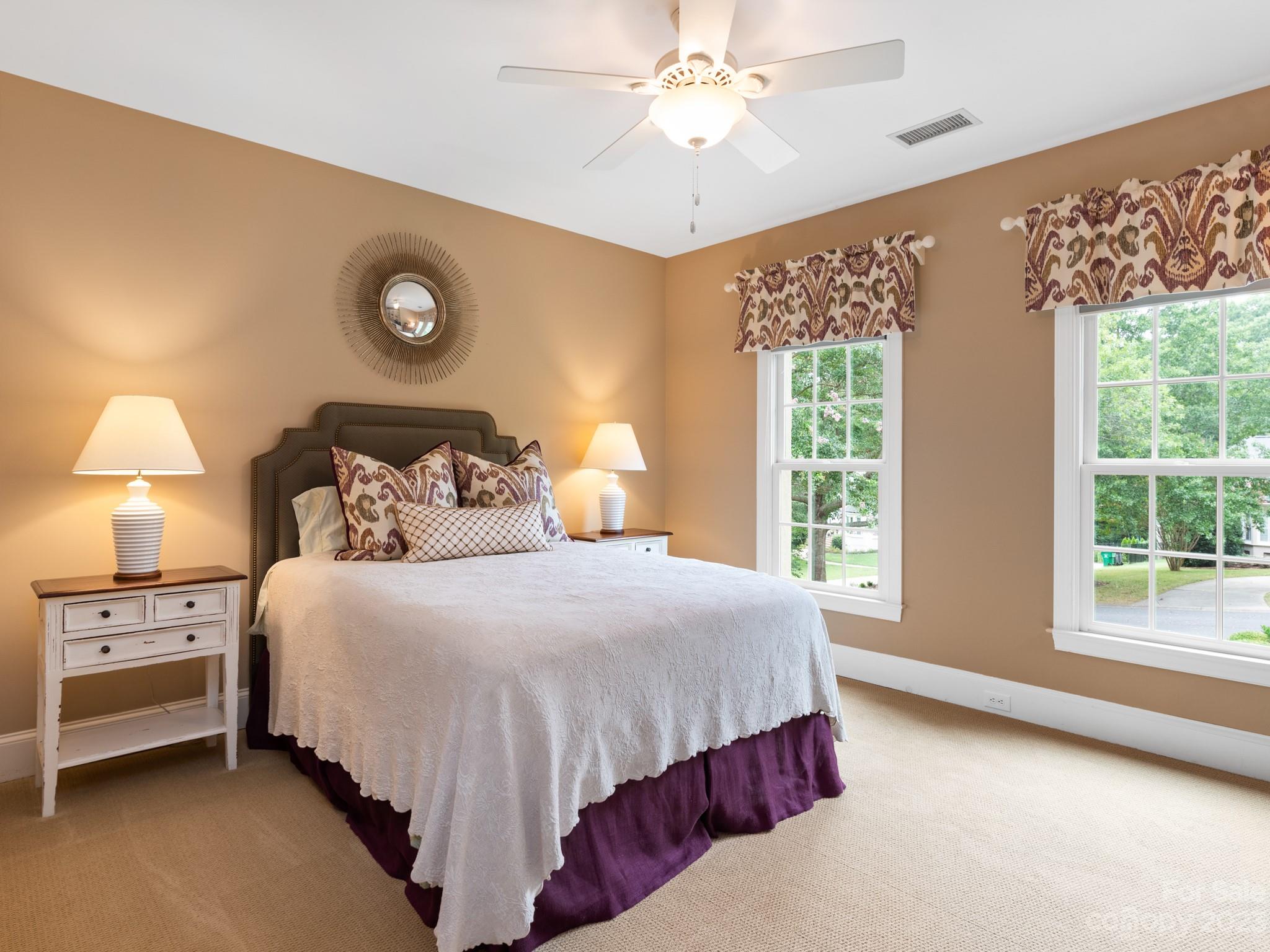 2521 Summerlake Road Charlotte, NC 28226 - Photo 35 of 48 a bedroom with a bed and a large window