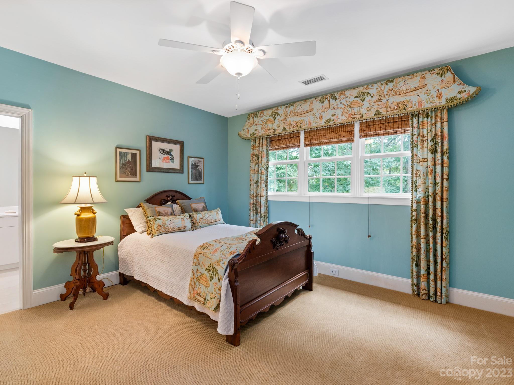 2521 Summerlake Road Charlotte, NC 28226 - Photo 40 of 48 a spacious bedroom with a bed and a window