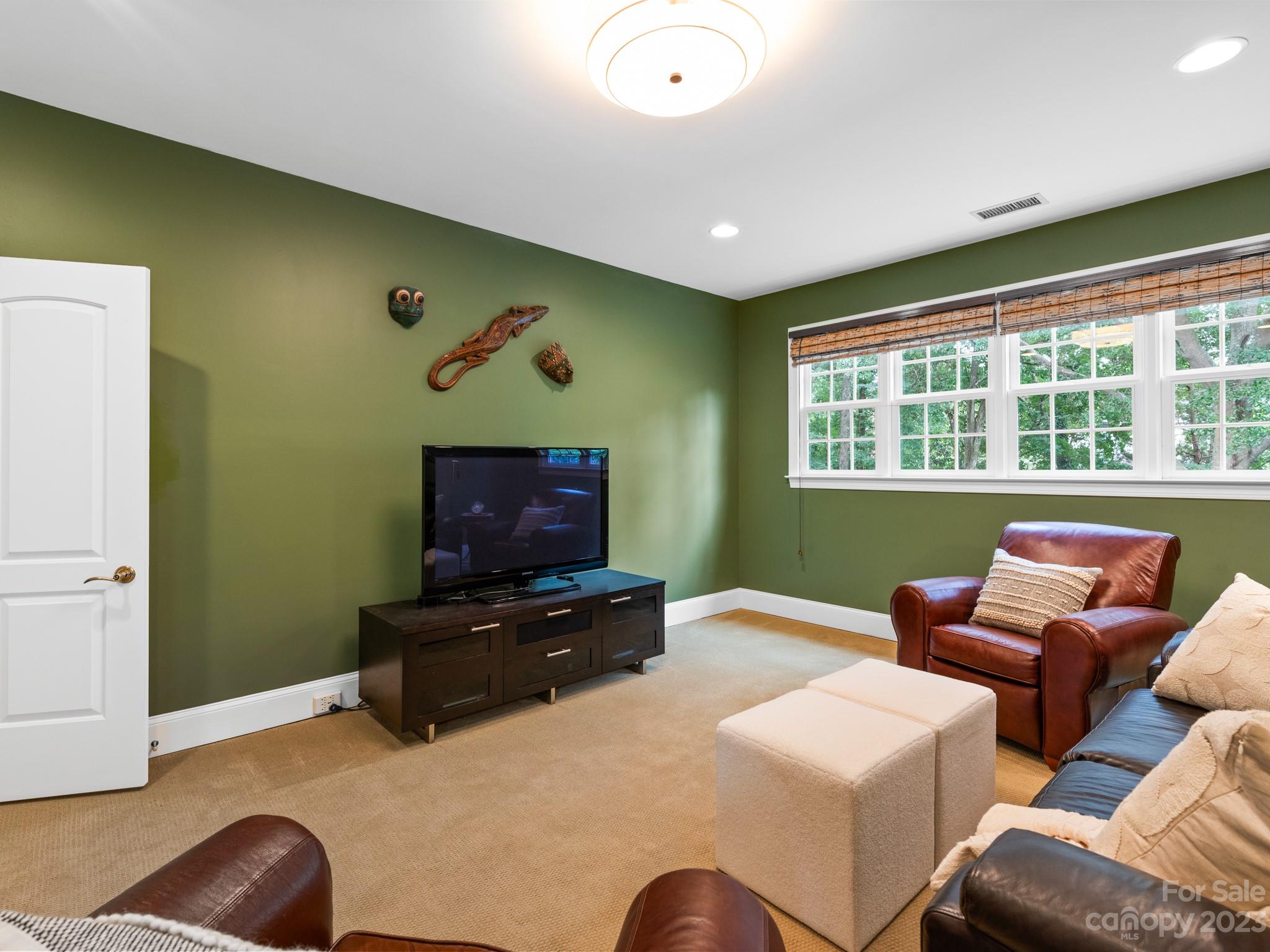 2521 Summerlake Road Charlotte, NC 28226 - Photo 43 of 48 a living room with furniture and a flat screen tv