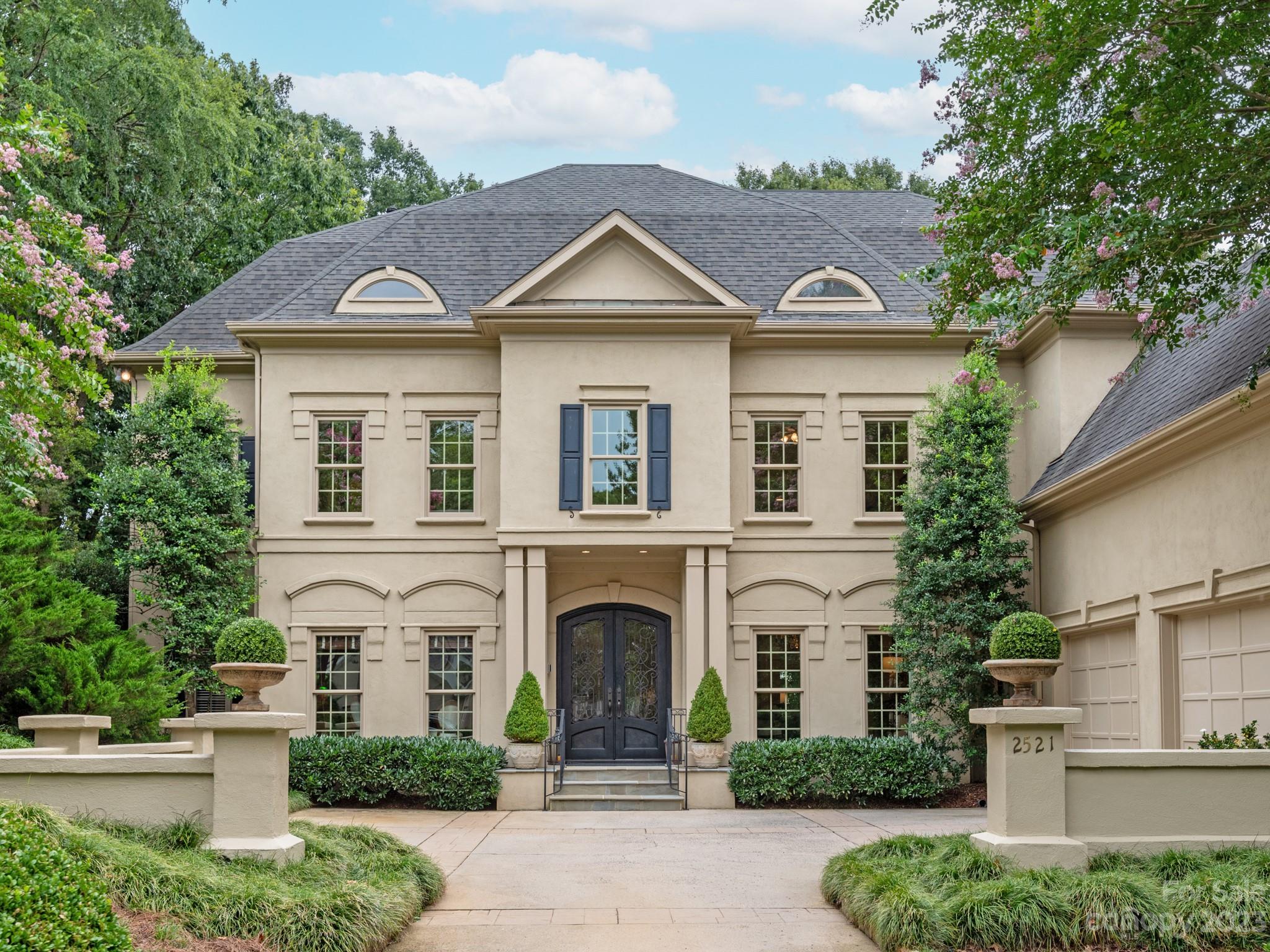 2521 Summerlake Road Charlotte, NC 28226 - Photo 47 of 48 a front view of a house with yard and parking