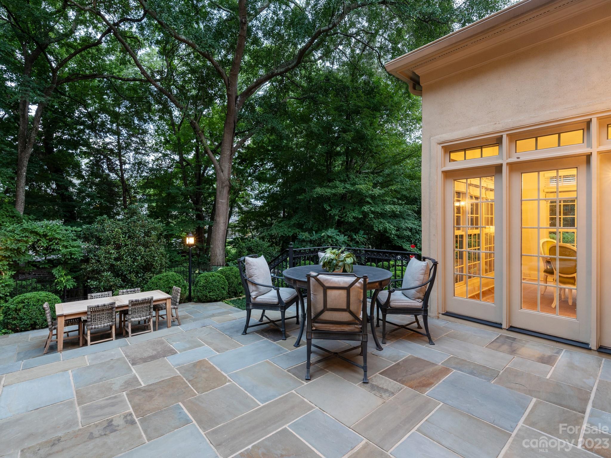 2521 Summerlake Road Charlotte, NC 28226 - Photo 6 of 48 a view of a patio with table and chairs and couches