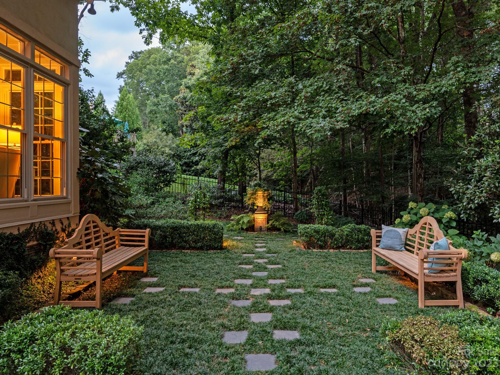 2521 Summerlake Road Charlotte, NC 28226 - Photo 7 of 48 a backyard of a house with yard and outdoor seating