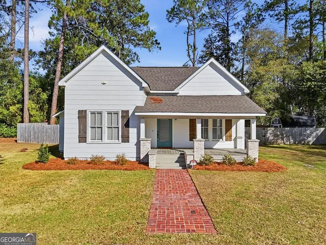 a front view of a house with patio
