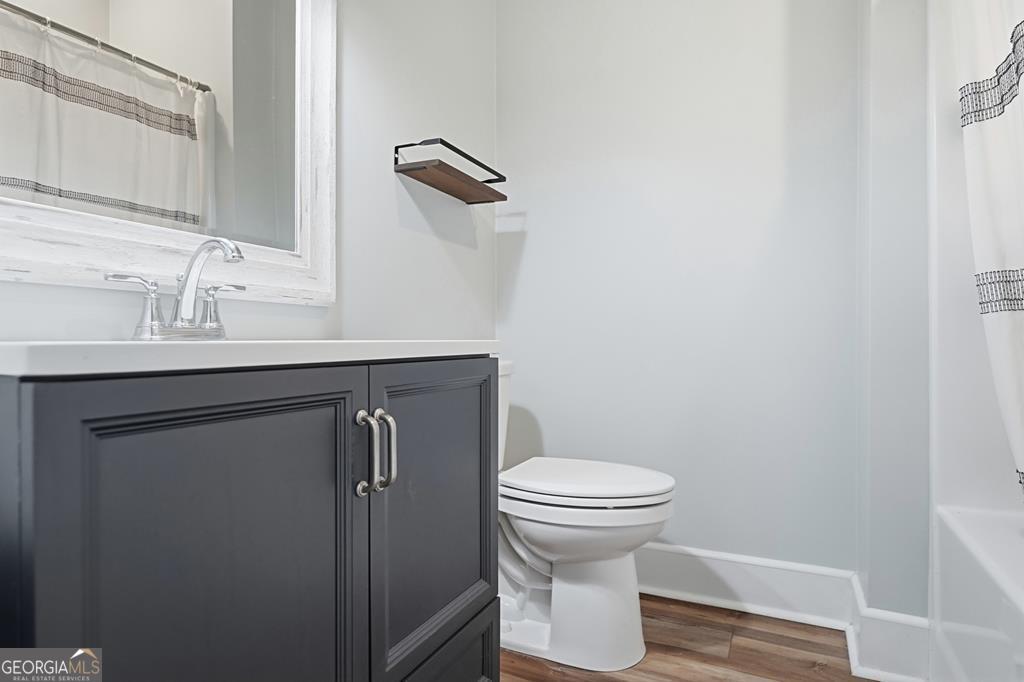 611 West 3rd Street Ocilla, GA 31774 - Photo 22 of 53 a bathroom with a sink and a toilet