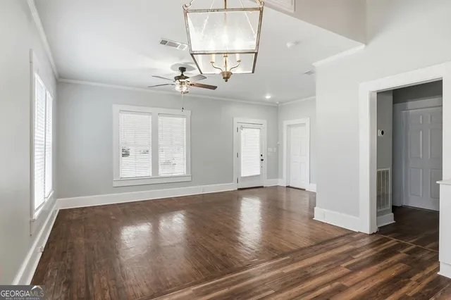 a bathroom with a bath tub with a shower