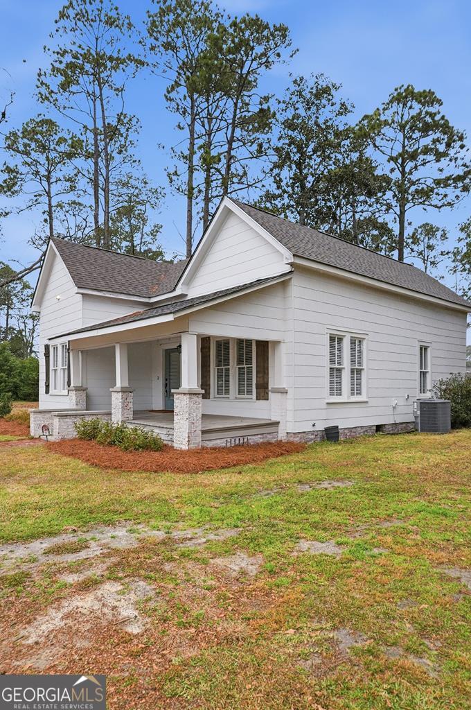 611 West 3rd Street Ocilla, GA 31774 - Photo 38 of 53 a front view of a house with a yard