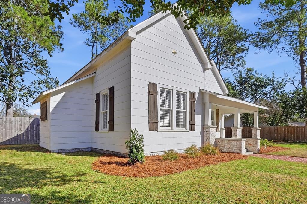 611 West 3rd Street Ocilla, GA 31774 - Photo 40 of 53 a view of a house with a yard