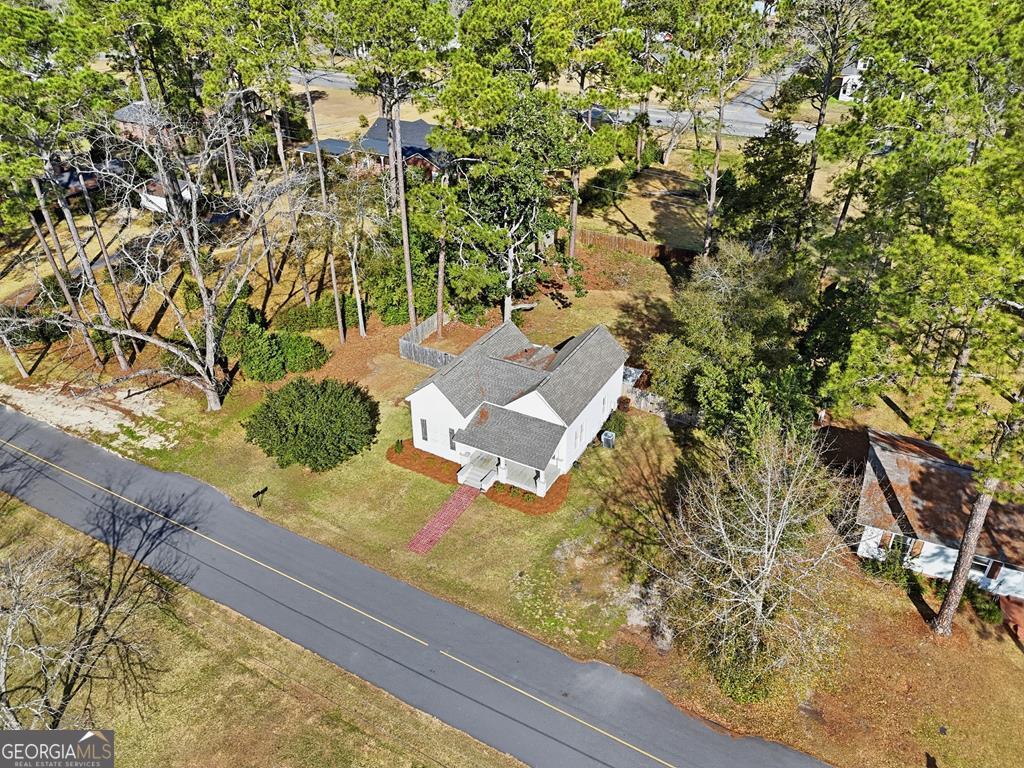 611 West 3rd Street Ocilla, GA 31774 - Photo 48 of 53 a view of a yard with wooden fence