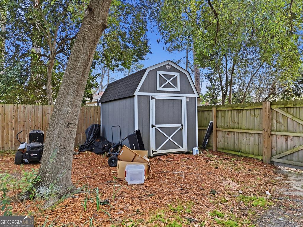 611 West 3rd Street Ocilla, GA 31774 - Photo 50 of 53 a front view of a house with garden