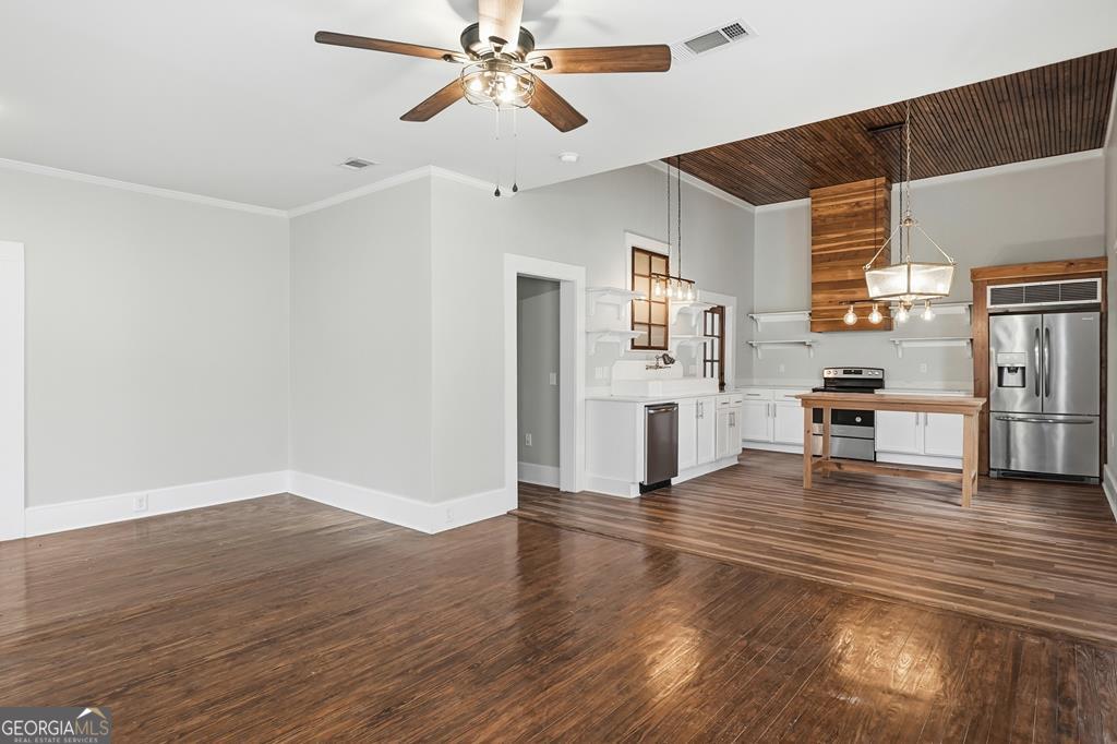 611 West 3rd Street Ocilla, GA 31774 - Photo 7 of 53 a view of empty room with wooden floor