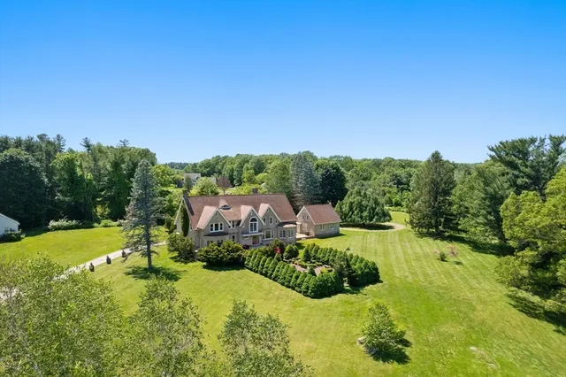 a view of a house with big yard